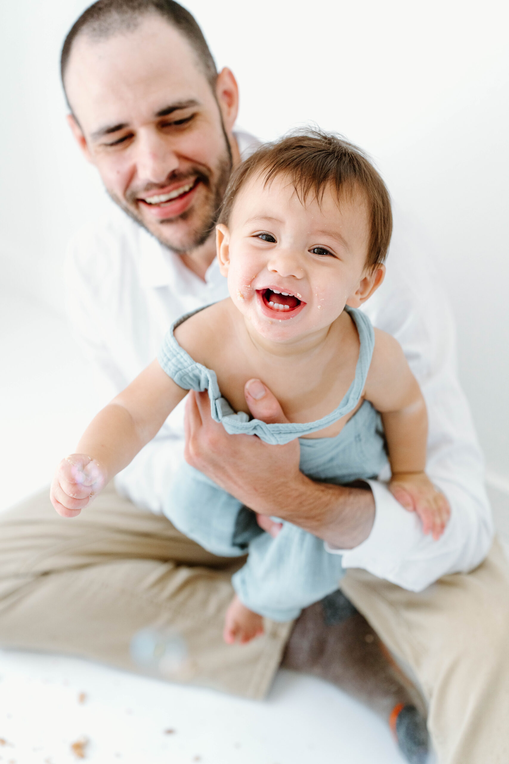 Zachary and his dad laugh together